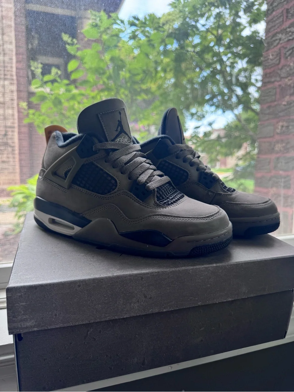 Air Jordan 4 Retro Sneakers in Dark Grey